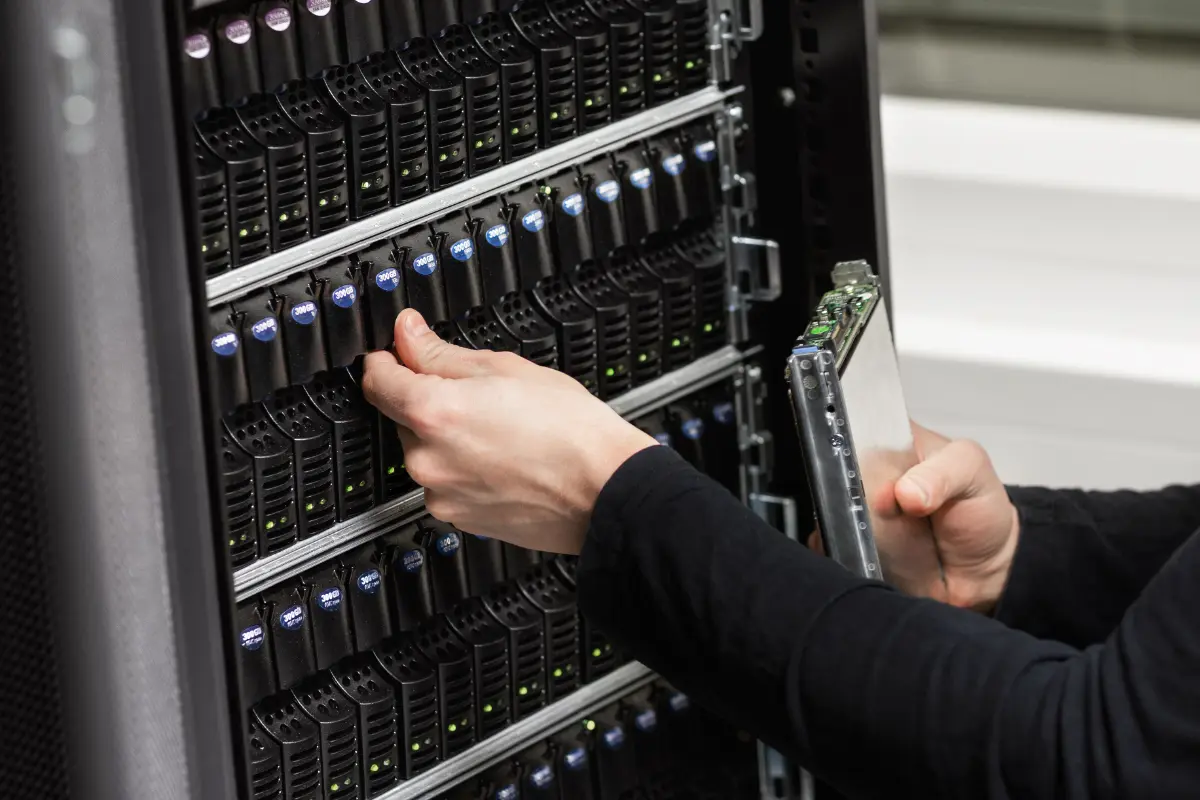 Team in server room maintaining cloud storage